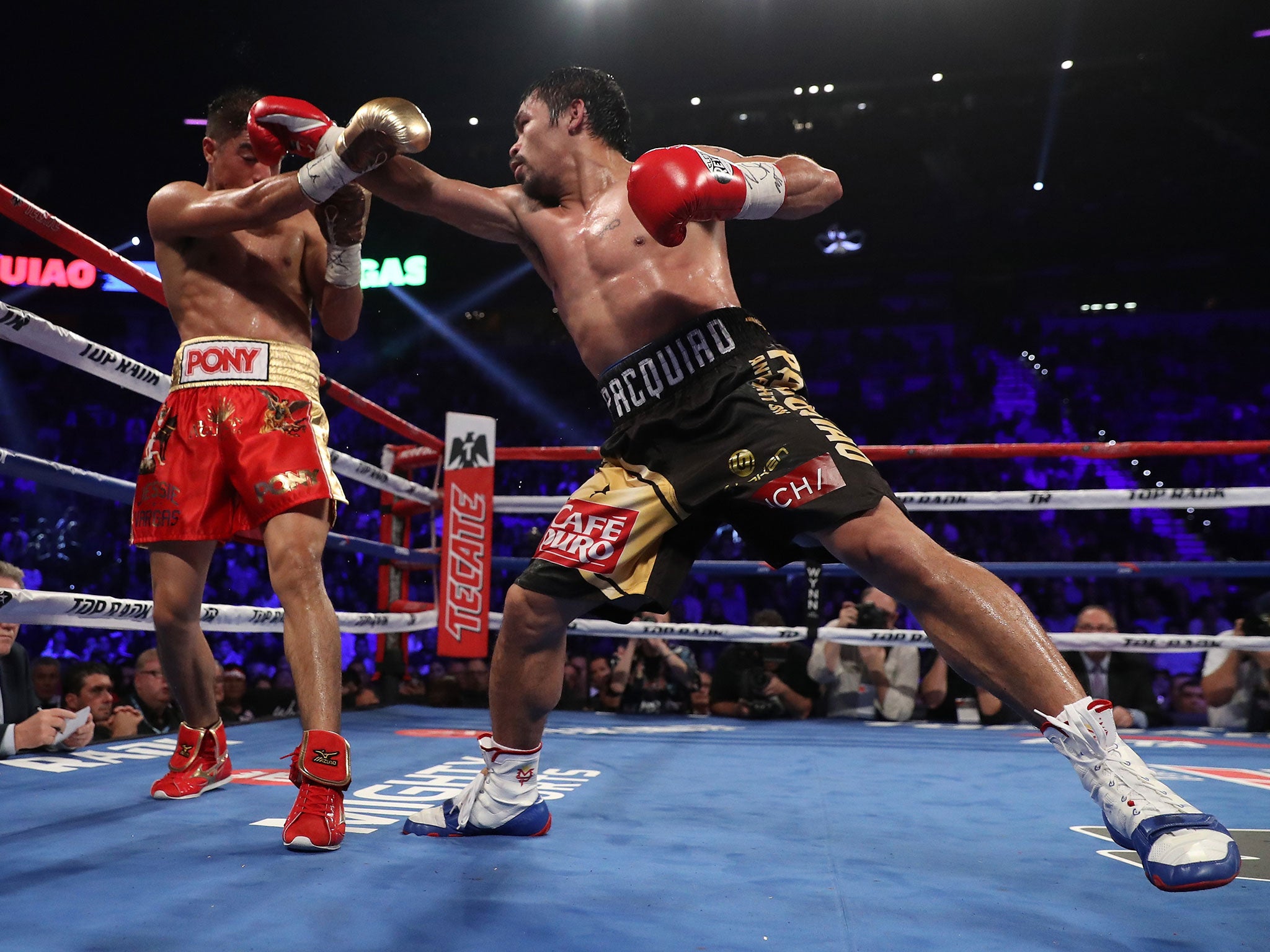 Pacquiao lands a blow against his American opponent