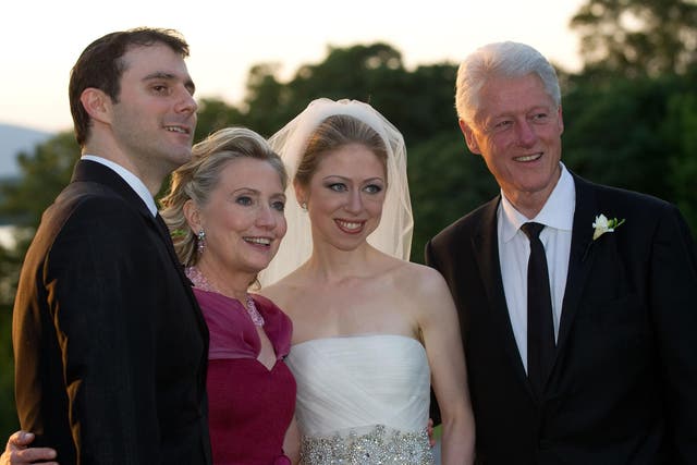 From left to right, Marc Mezvinsky, Hillary Clinton, Chelsea Clinton and former US President Bill Clinton pose during the wedding of Chelsea Clinton and Marc Mezvinsky at the Astor Courts Estate on 31 July, 2010, in Rhinebeck, New York