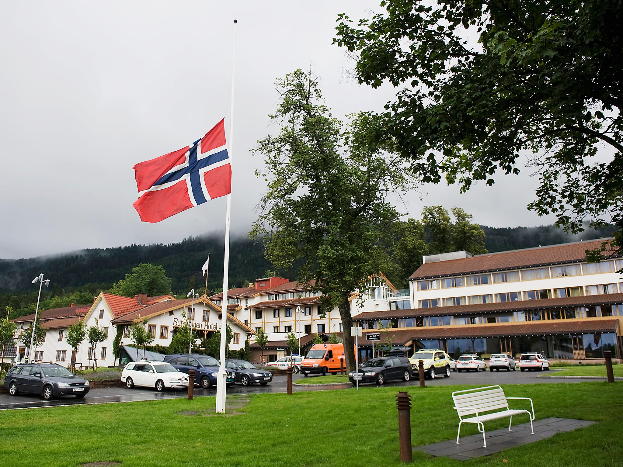 The Norwegian flag at half-mast outside a hotel in Sundvolden where survivors of the attack were reunited with their families two days after the shootings