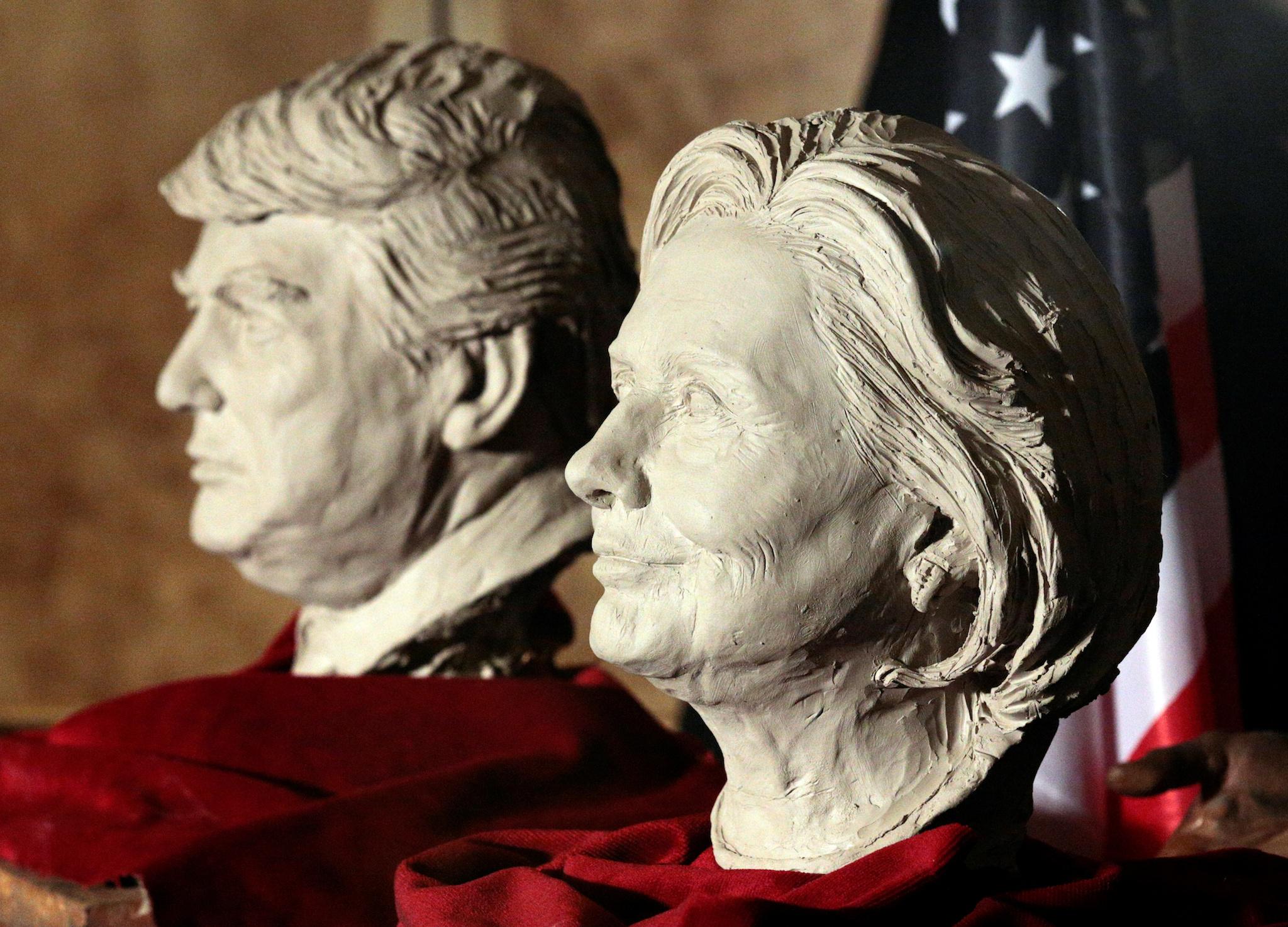 Clay busts of U.S. presidential candidates Hillary Clinton and Donald Trump are seen at the Wax Museum in Madrid, Spain, November 4, 2016