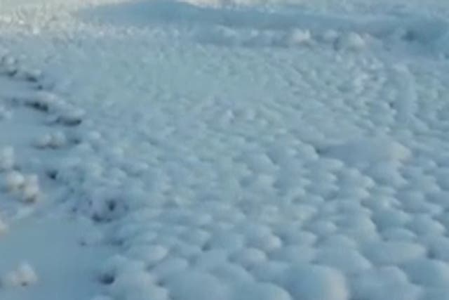 Giant snowballs have formed on a beach in Russia