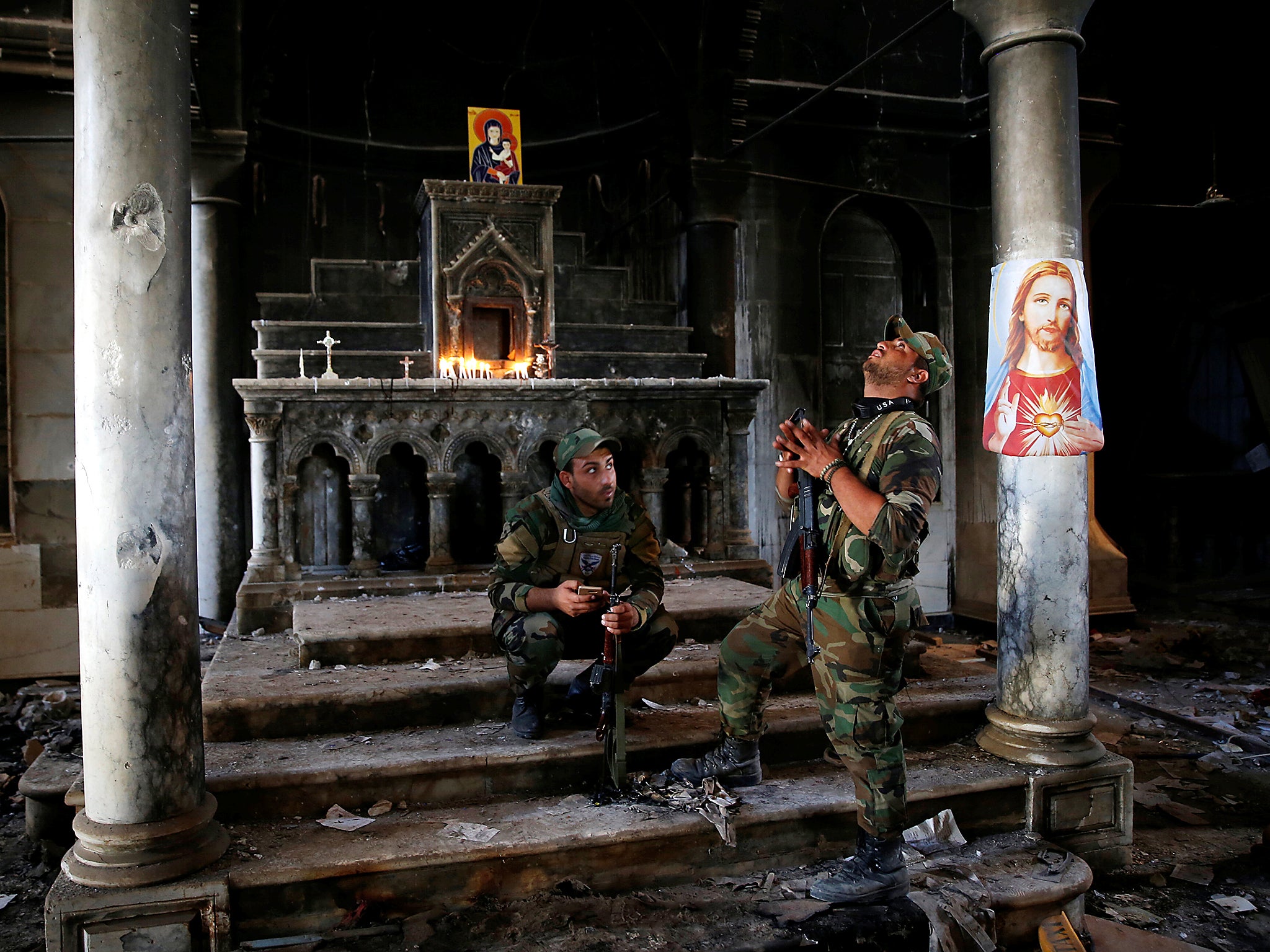 Iraqi soldiers at the Grand Immaculate Church in Qaraqosh, near Mosul