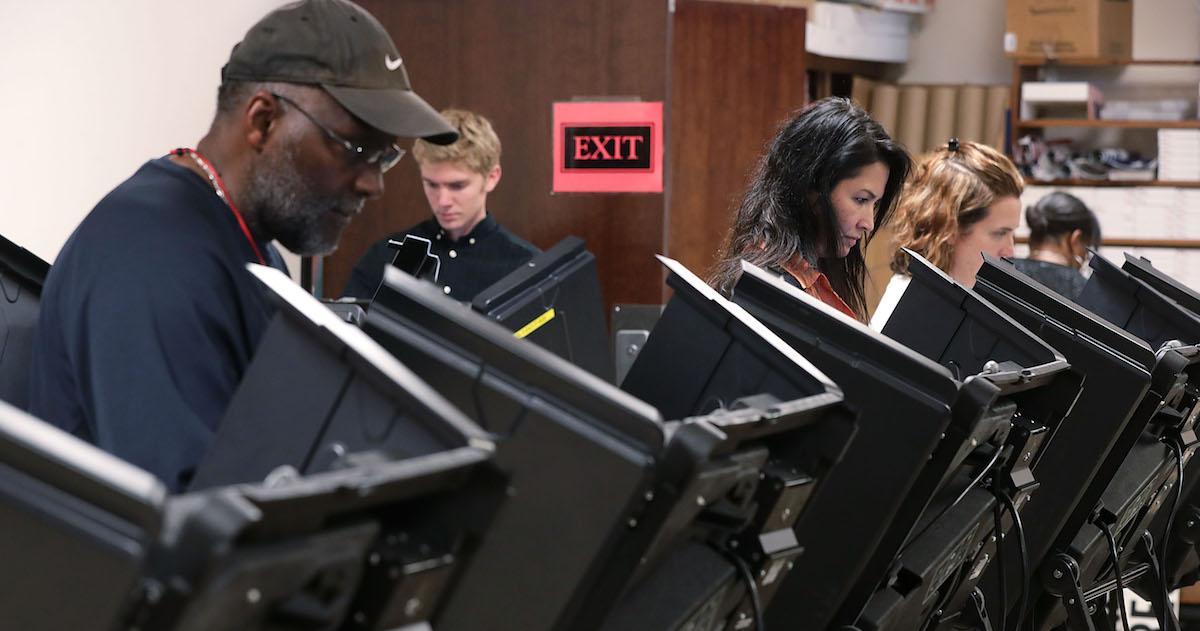 Voters cast their ballots during early voting for the 2016 general election at Forsyth County Government Center October 28, 2016 in Winston-Salem, North Carolina. Early voting has begun in North Carolina through November 5.
