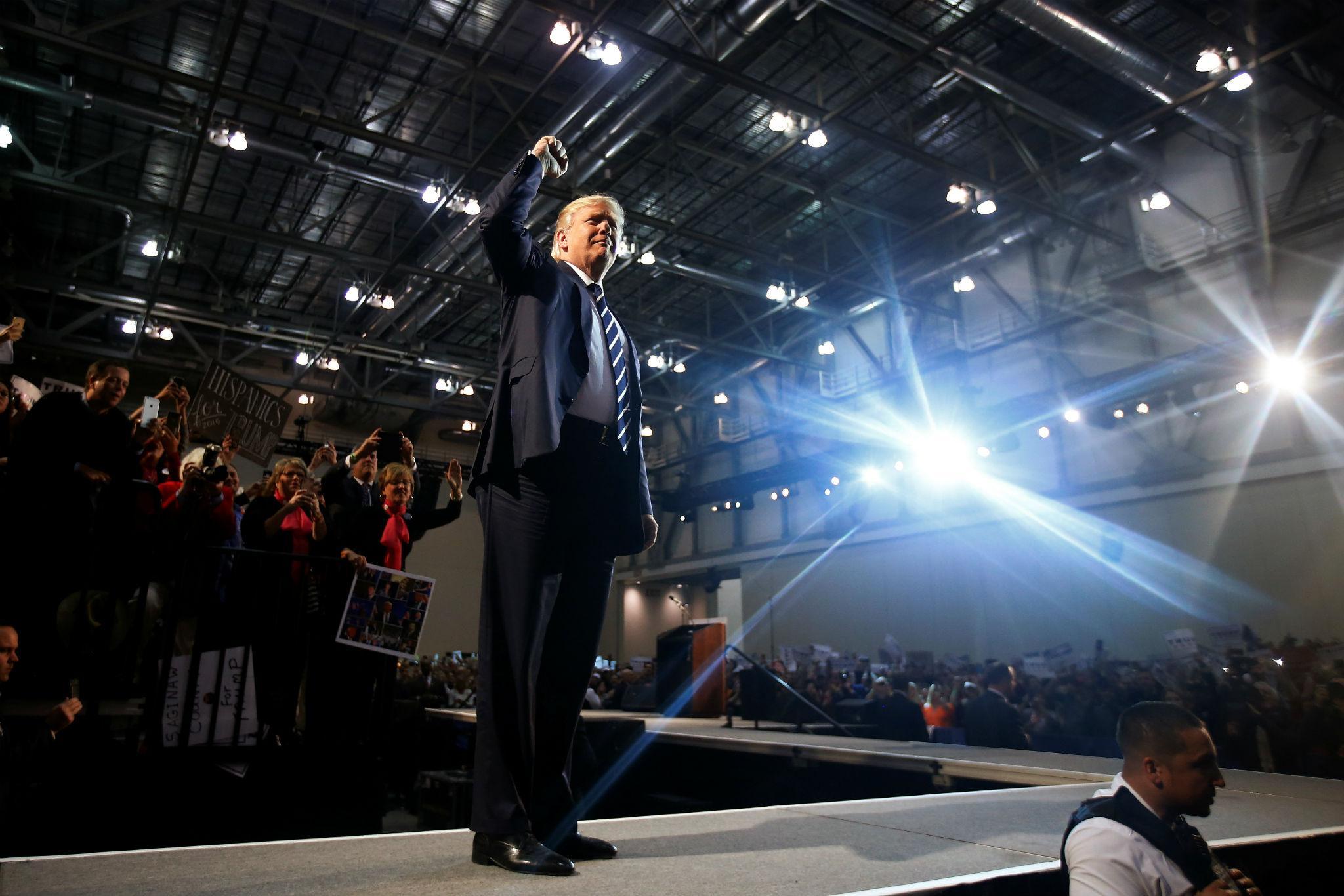 Trump arrives at his final presidential campaign rally in Grand Rapids, Michigan, just after midnight on election day