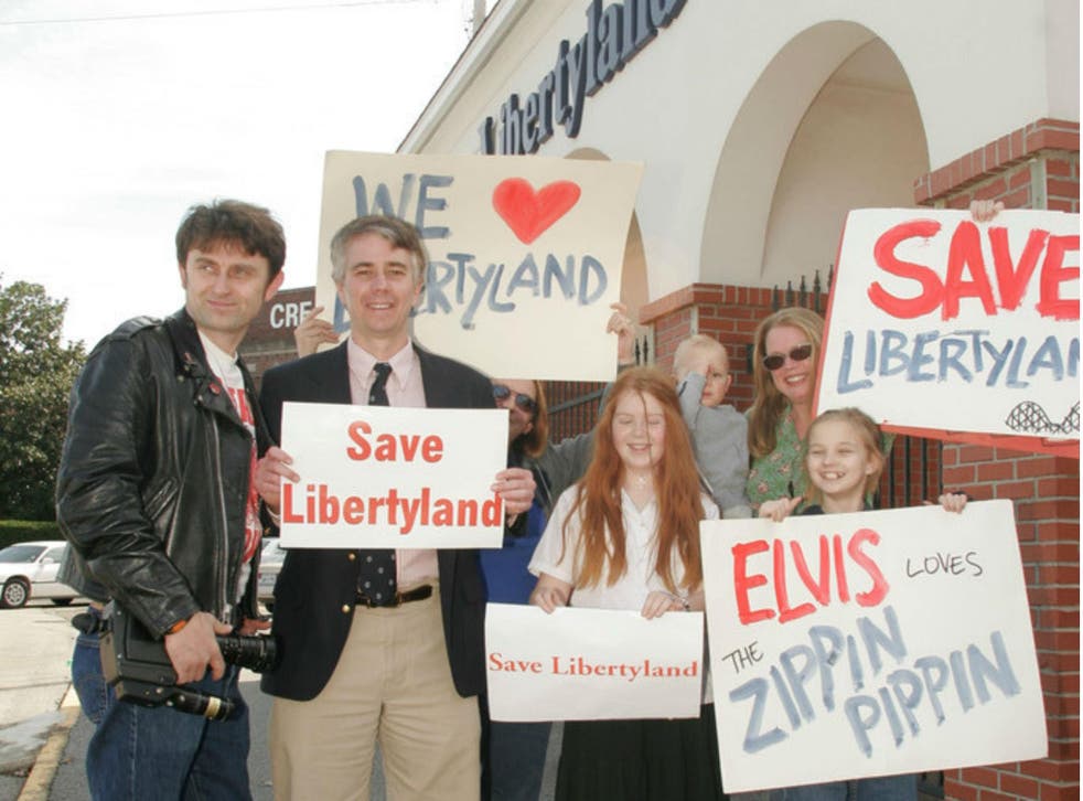 Destroy Memphis: Director Mike McCarthy (front left), Steve Mulloy and Denise Parkinson (front right) lead a demonstration to save Elvis Presley's favourite fairground Libertyland roller coaster, The Zippin Pippin, from the bulldozers