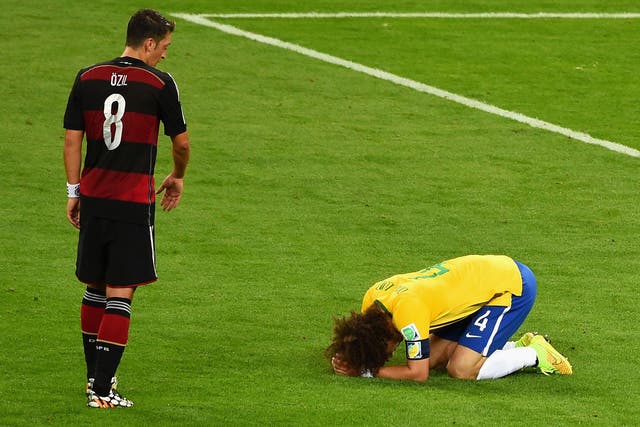 David Luiz embodied the devastation of a nation following defeat to Mesut Ozil's Germany