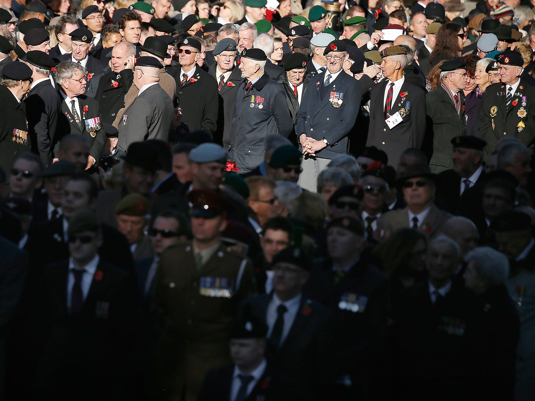 Servicemen and women gather during the parade on Whitehall close to the Cenotaph during Remembrance Sunday