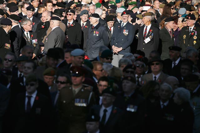Servicemen and women gather during the parade on Whitehall close to the Cenotaph during Remembrance Sunday
