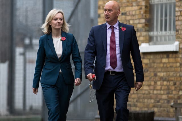  Secretary Of State For Justice Liz Truss is escorted around HMP Brixton by the Prison Govenor David Bamford