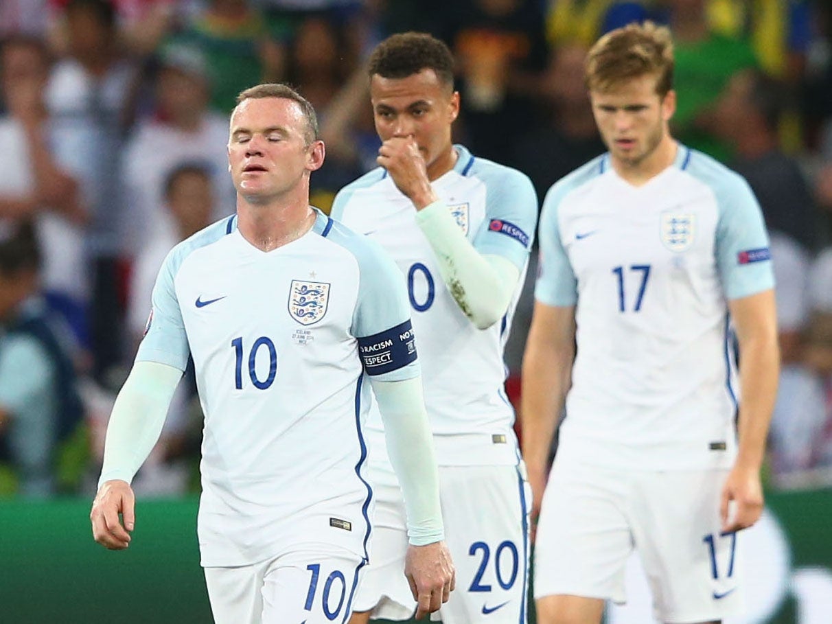 Wayne Rooney leads a dejected England out of Euro 2016