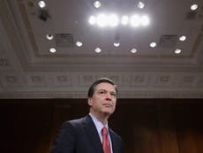 Who is FBI Director James Comey, who reopened probe into Clinton?