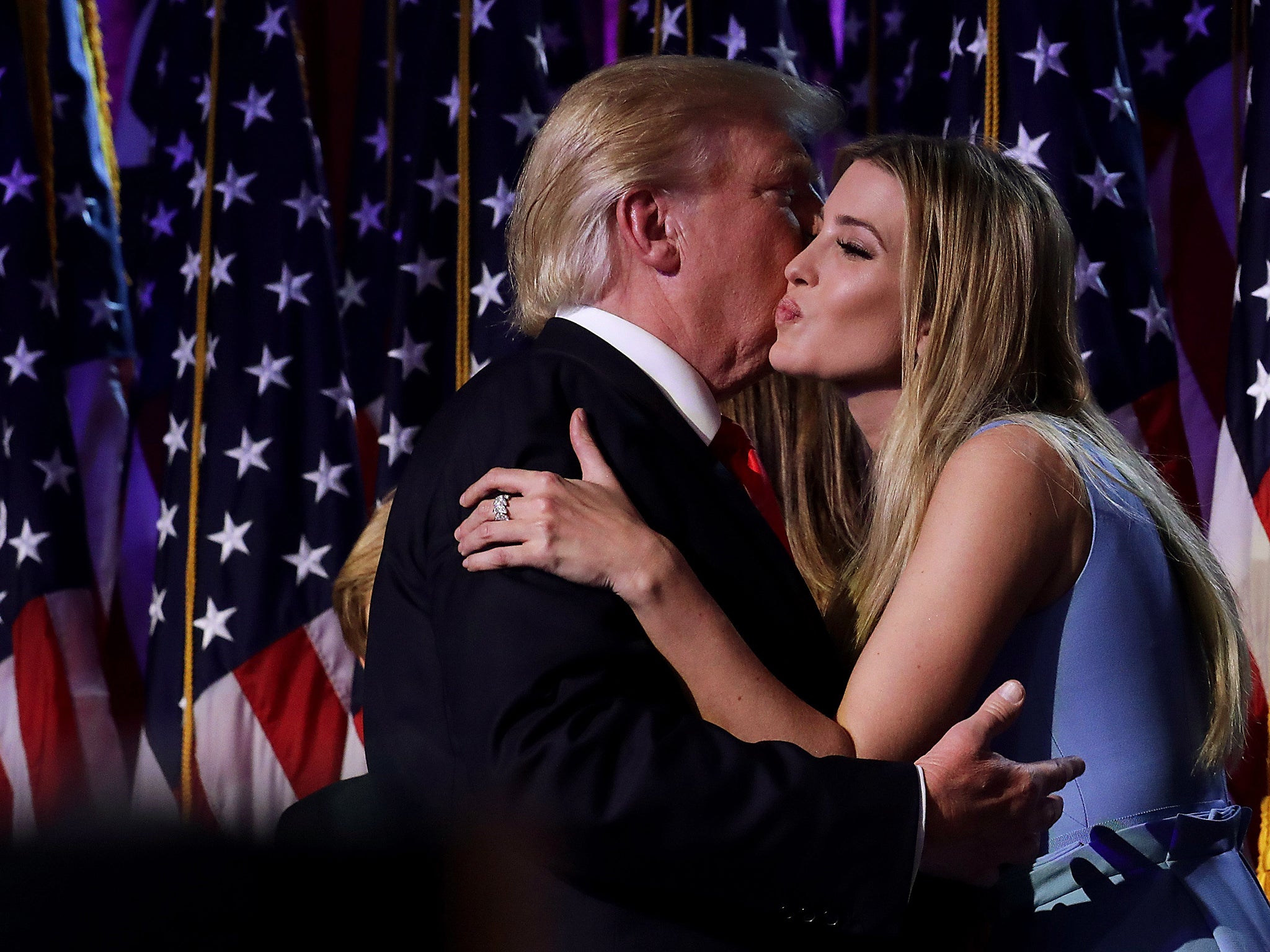 Republican president-elect Donald Trump and his daughter Ivanka Trump embrace after delivering his acceptance speech at the New York Hilton Midtown