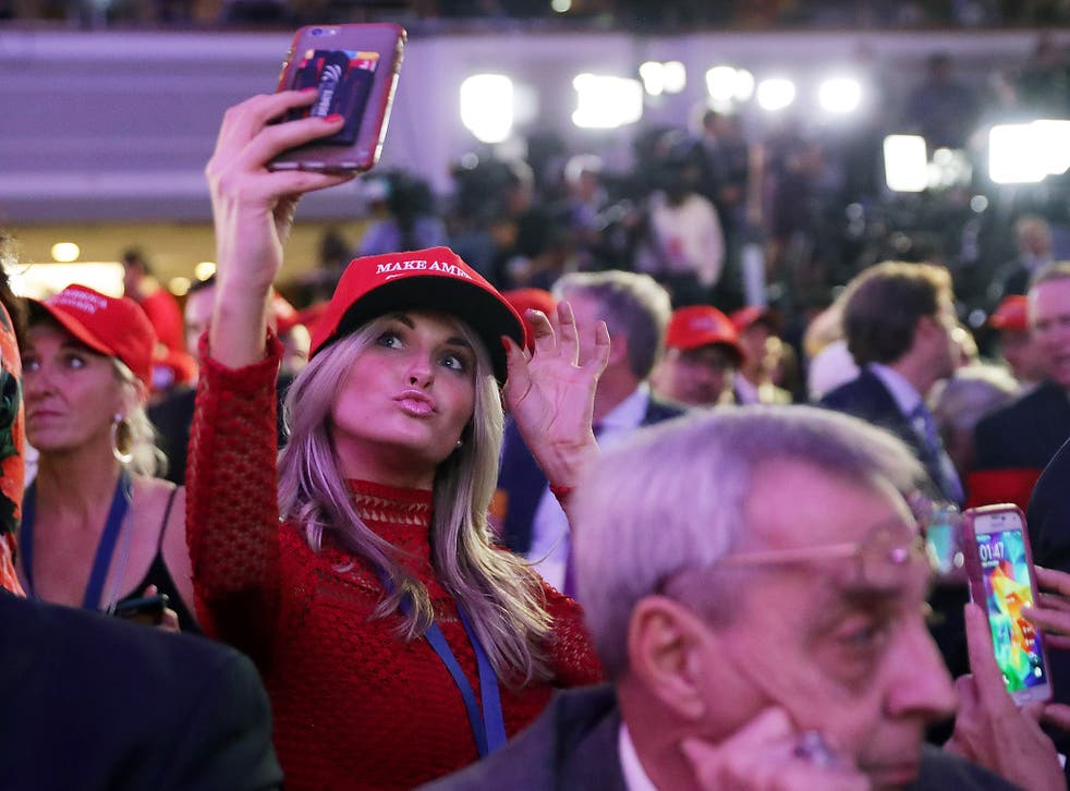 A woman takes a selfie during Republican presidential candidate Donald Trump's election night event in New York 