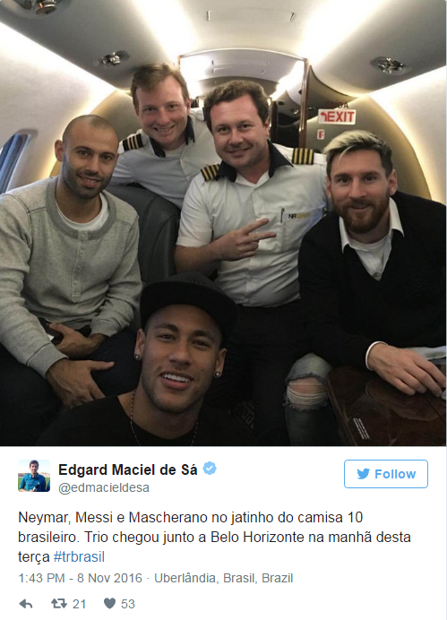 The trio share a laugh with their pilots on Neymar's private jet