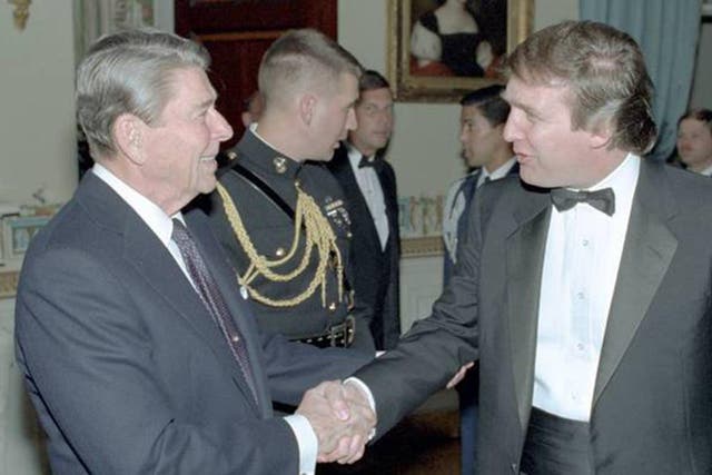 President Reagan greets Donald Trump at a 1987 White House reception