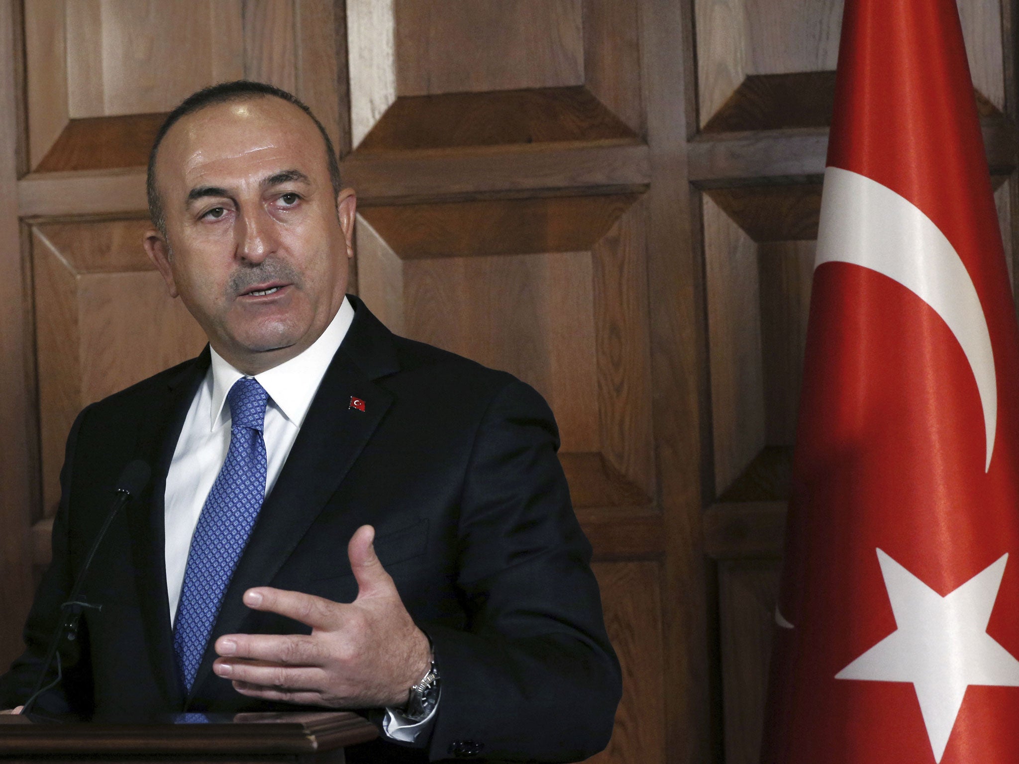 Turkish Foreign Minister Mevlut Cavusoglu speaks to the media in Ankara