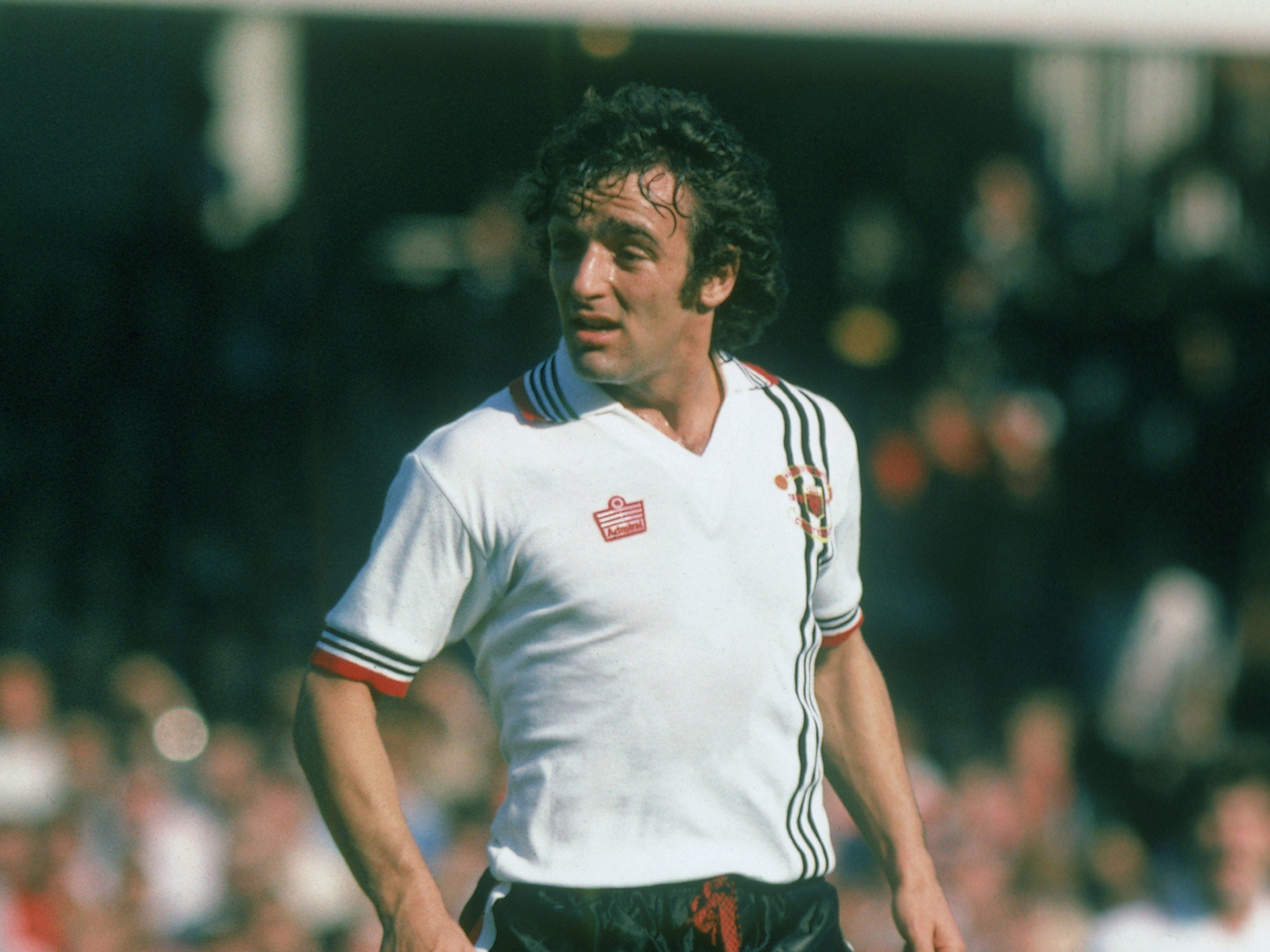 Macari played for Manchester United at the time