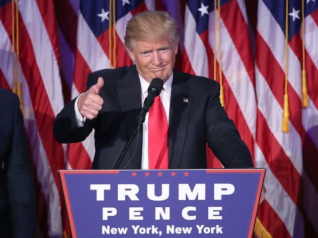 Donald Trump gives a thumbs up to the crowd during his acceptance speech at the New York Hilton Midtown