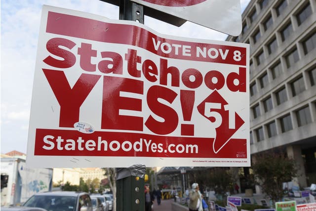 A sign supporting D.C. statehood on display outside an early voting site in Washington