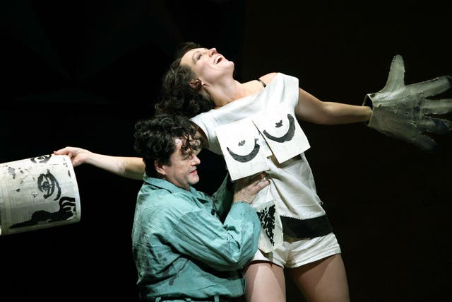 Michael Colvin as The Painter/The Second Client and Brenda Rae as Lulu in the ENO's production of Lulu