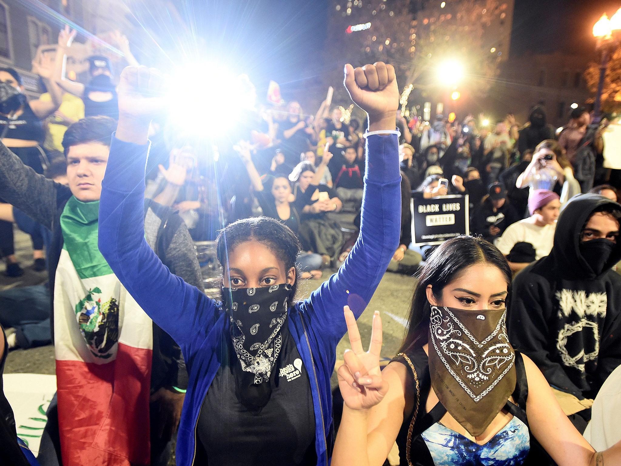 Demonstrators rally following the election of Republican Donald Trump as President of the United States, in Oakland, California