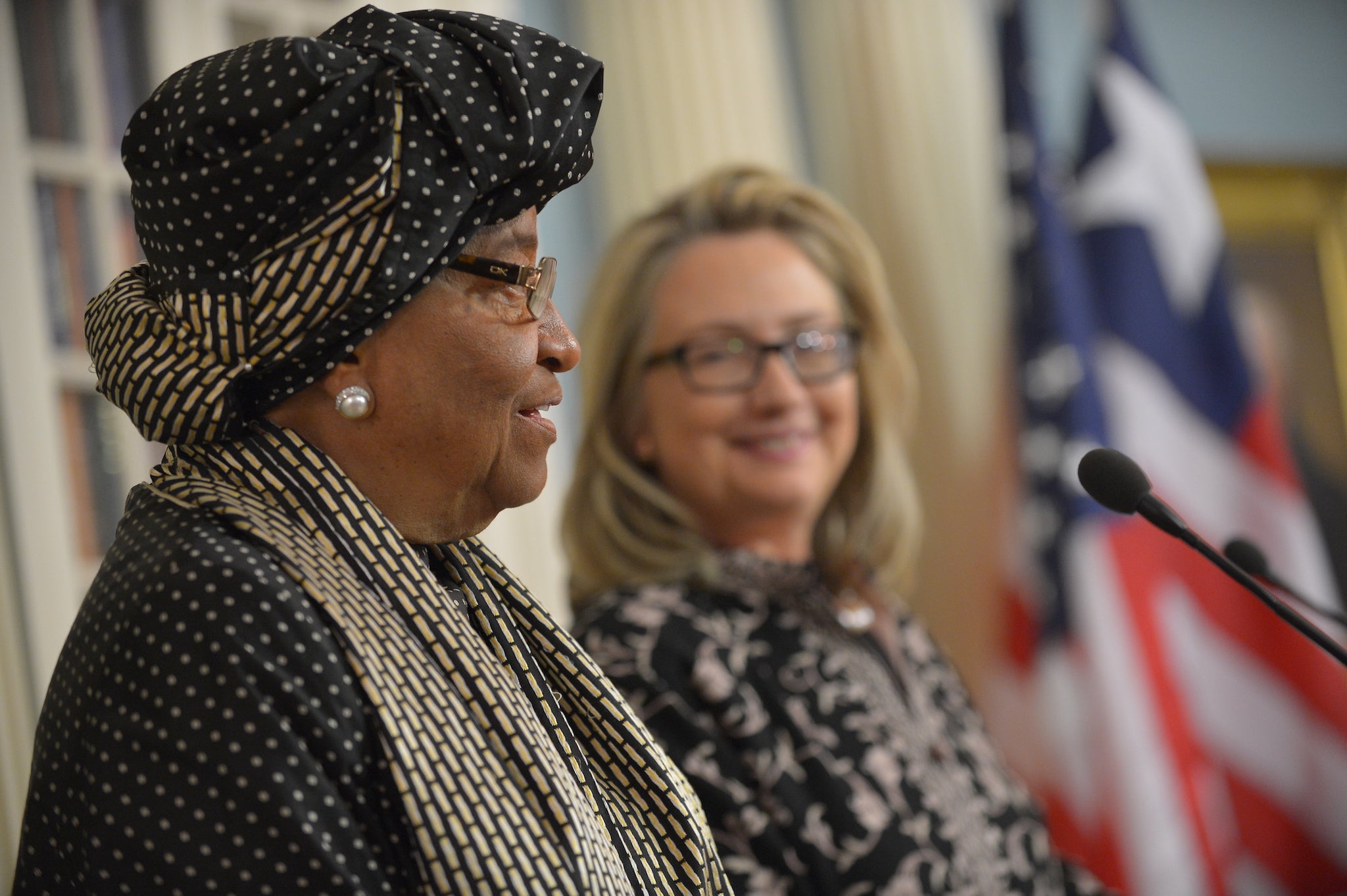 Liberian President Ellen Johnson Sirleaf speaks to the press with then-Secretary of State Hillary Clinton following a bilateral meeting on 15 January 2013 in Washington, DC