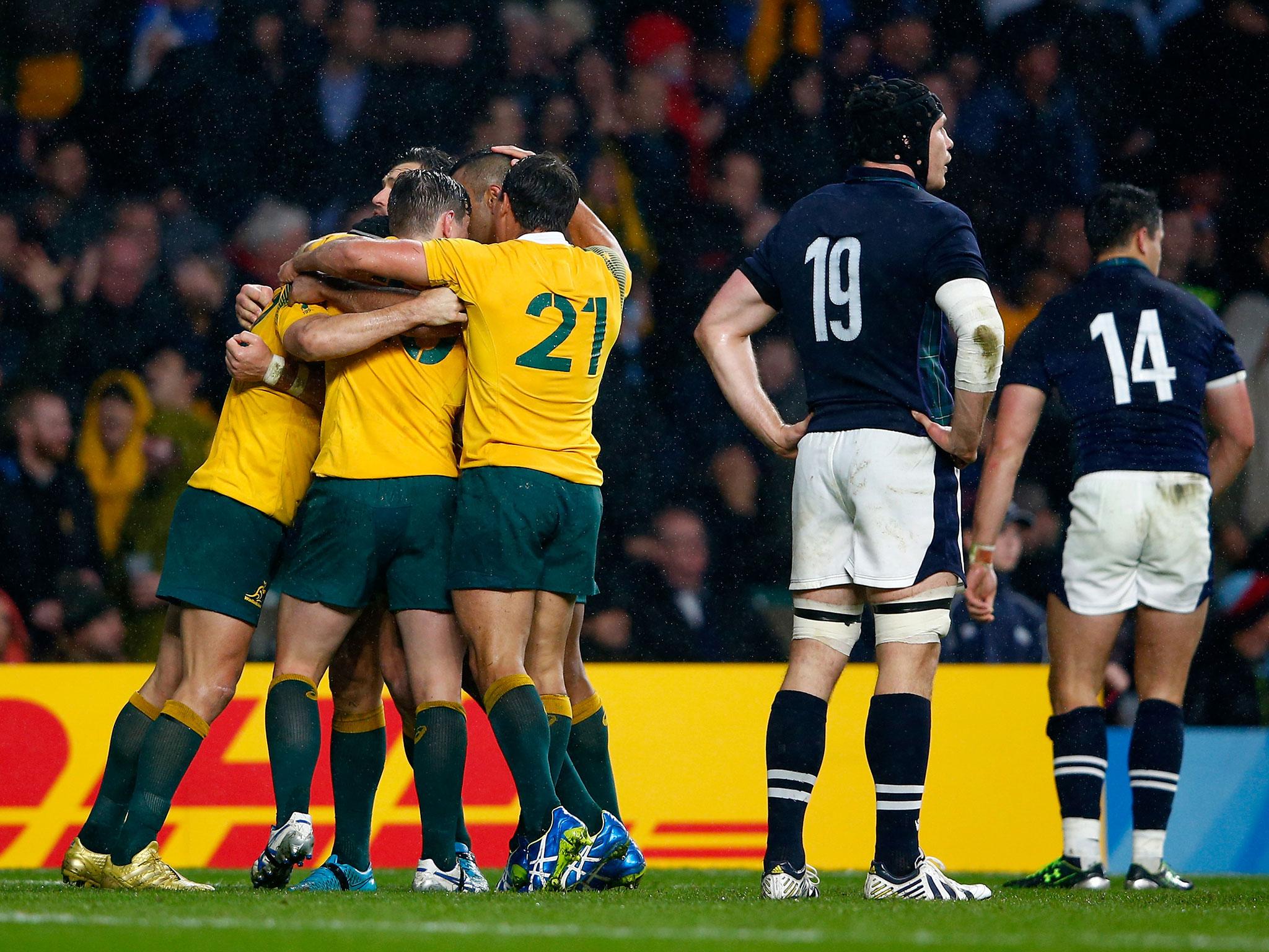 Australia celebrate following their dramatic 35-34 win over Scotland in the 2015 World Cup quarter-final