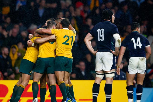 Australia celebrate following their dramatic 35-34 win over Scotland in the 2015 World Cup quarter-final