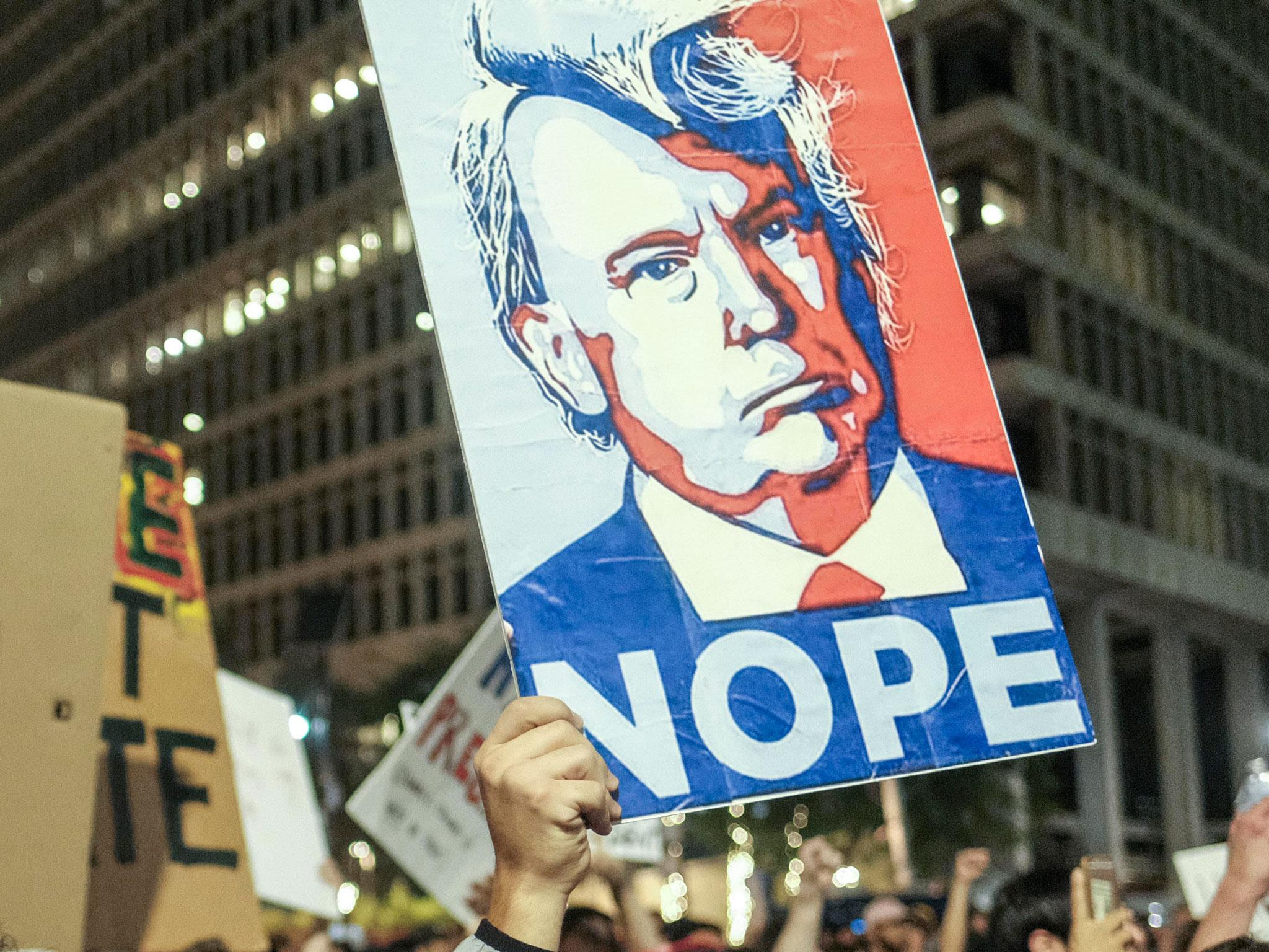 Protesters gather outside Trump Tower in New York after the election