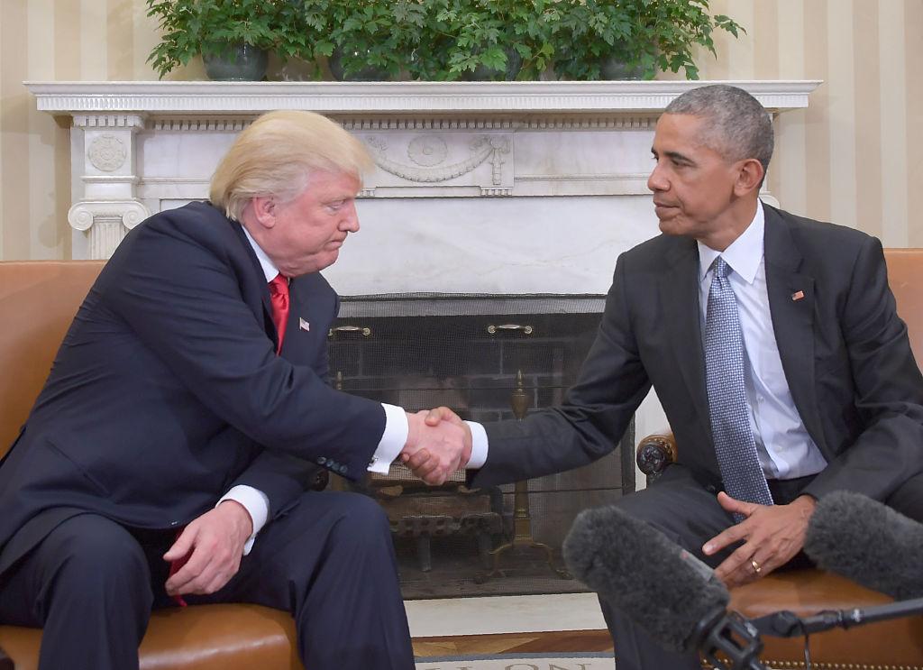 President Barack Obama shakes hands as he meets with Republican President-elect Donald Trump on transition planning in the Oval Office at the White House on November 10, 2016 in Washington DC.