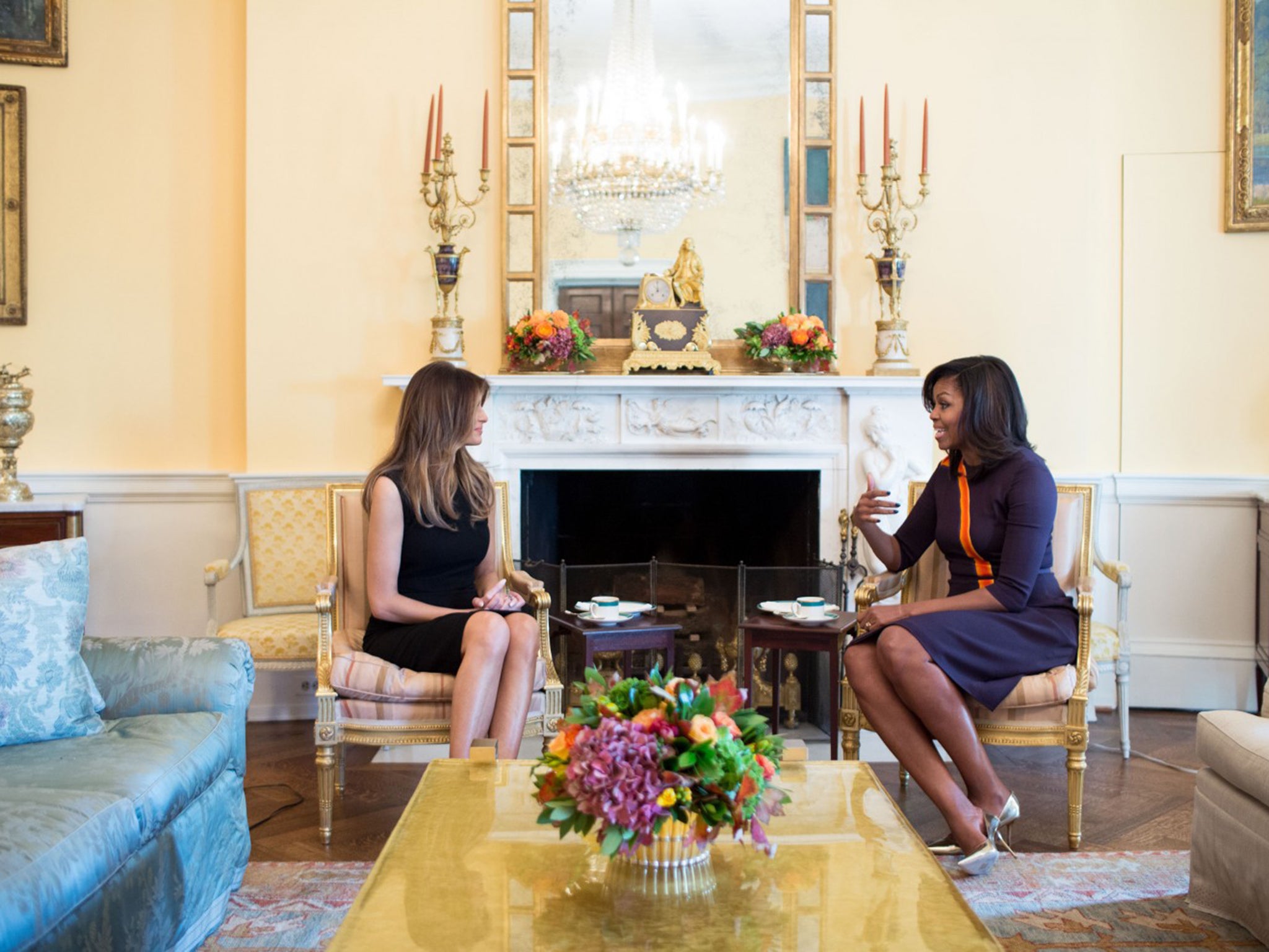 First Lady Michelle Obama meets with Melania Trump for tea in the Yellow Oval Room of the White House on November 10