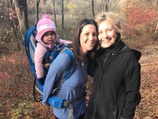 Voter runs into Hillary Clinton walking dogs during morning hike