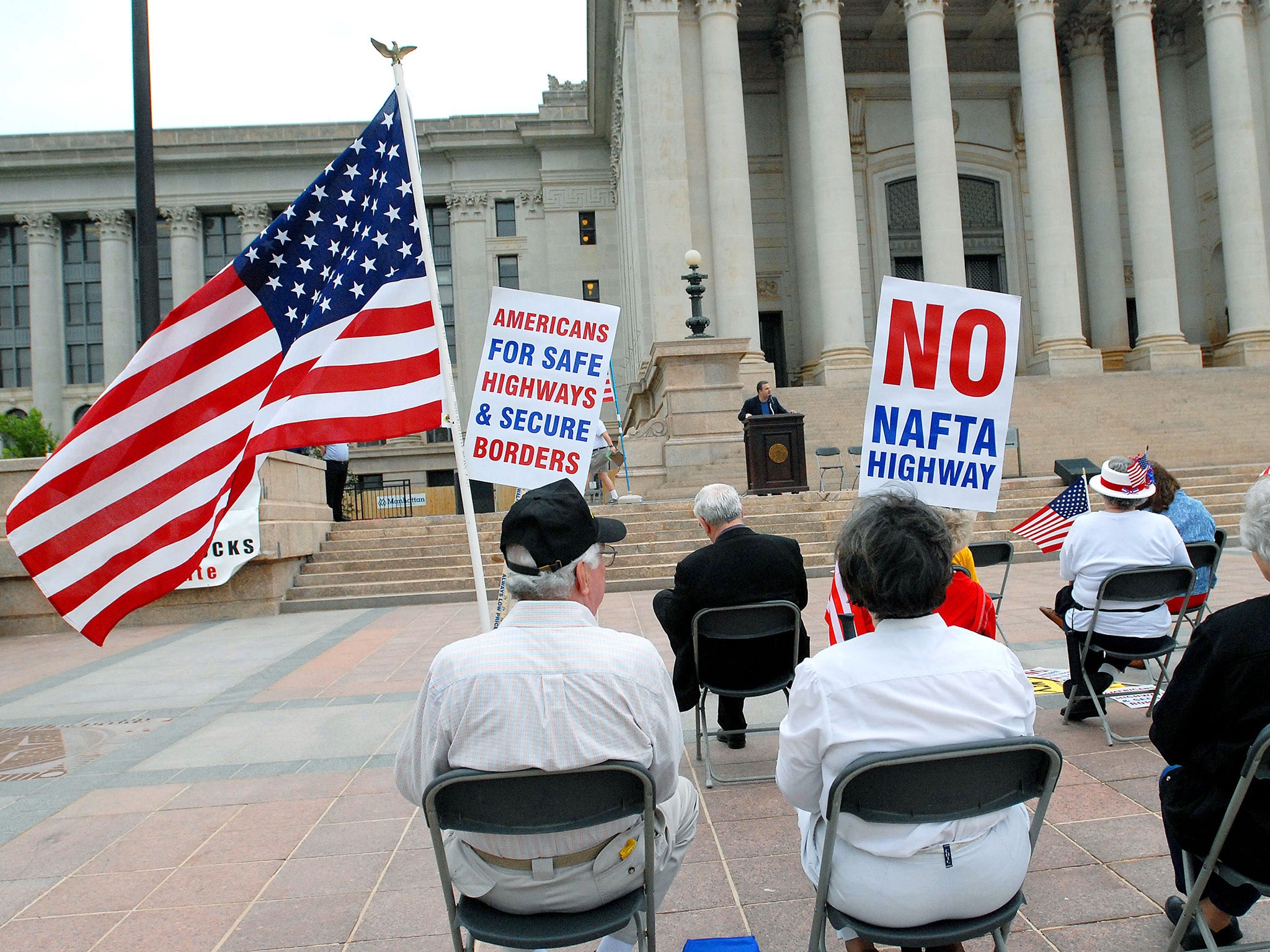 Donald Trump played on popular dislike of free trade deals during his campaign. Pictured: anti Nafta protesters in Oklahoma in 2007