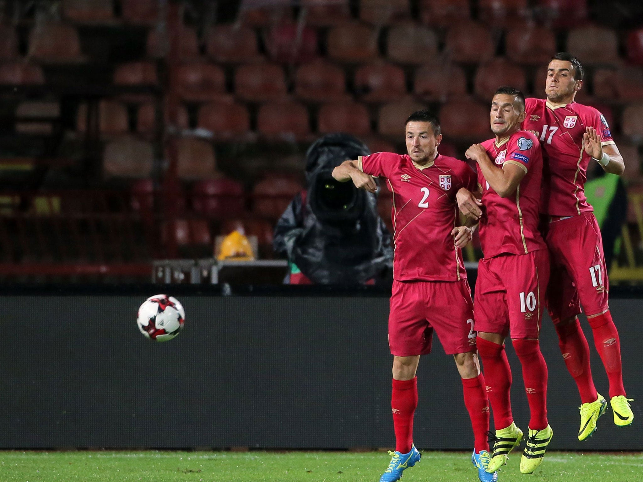 Filip Kostic (right) alongside Southampton's Dusan Tadic (centre) while representing Serbia