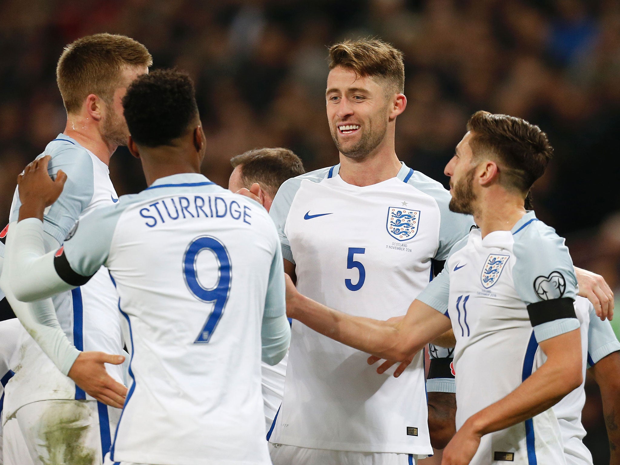 Gary Cahill is congratulated after scoring England's third goal against Scotland