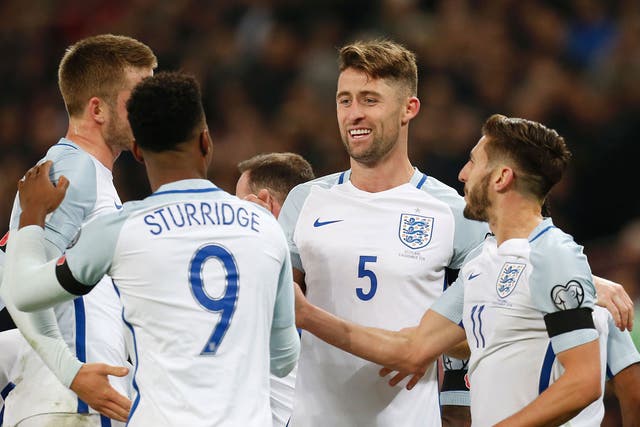 Gary Cahill is congratulated after scoring England's third goal against Scotland