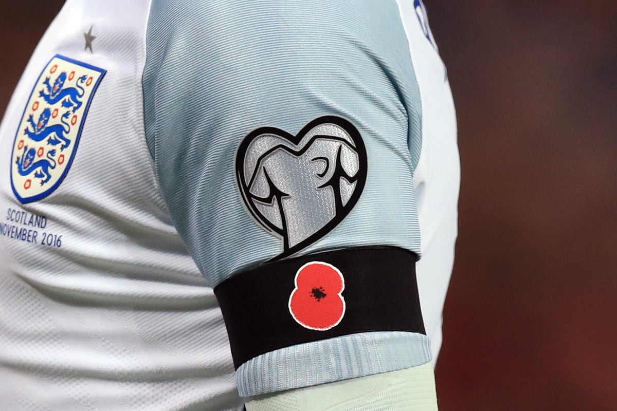 England and Scotland defy Fifa ban and wear poppies in World Cup ...