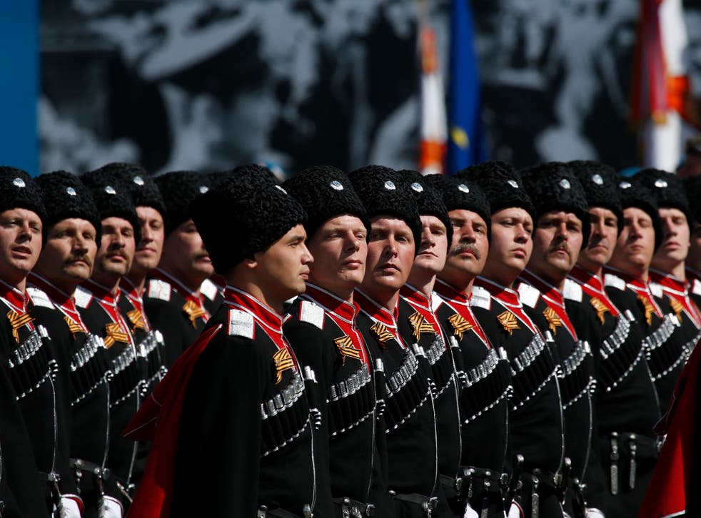 Russian Cossacks march during the Victory Day parade at Red Square in Moscow, Russia, May 9, 2015
