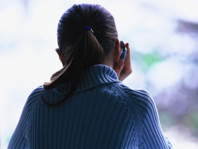 Young girl talking on phone