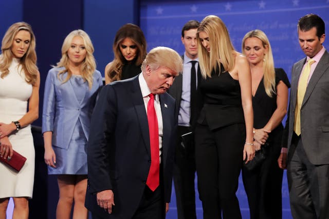 Donald Trump walks off stage as (L-R) Lara Yunaska, Vanessa Trump, Melania Trump, Jared Kushner, Ivanka Trump, Vanessa Trump and Donald Trump Jr. look on