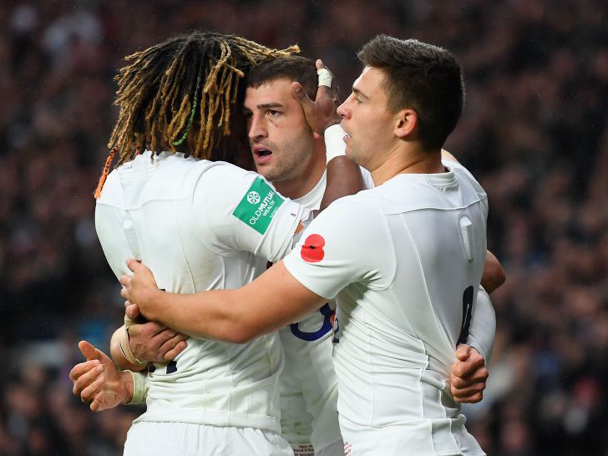 May celebrates scoring England's first try with Youngs and Yarde