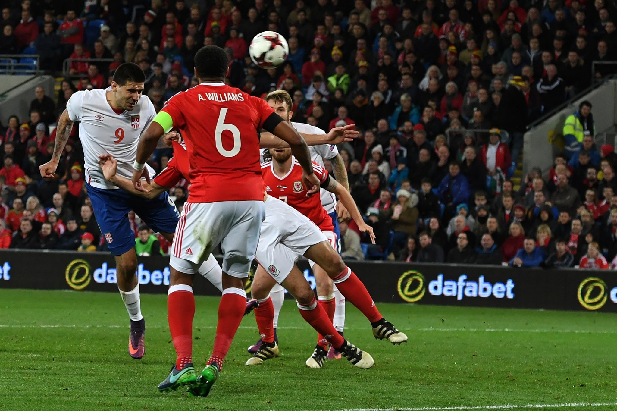 &#13;
Aleksandar Mitrovic heads in Serbia's equaliser in the closing minutes &#13;