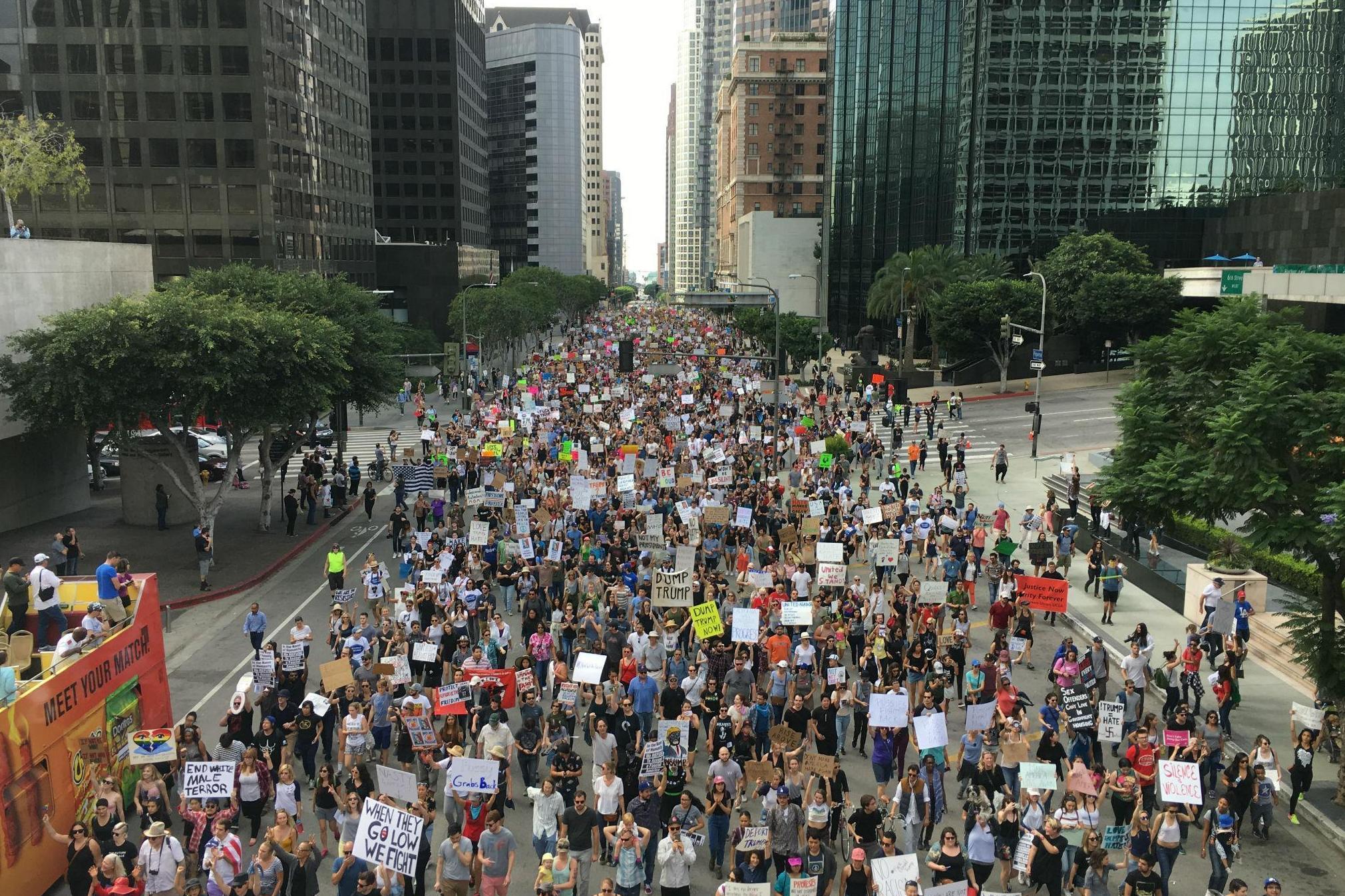 Police estimated at least 8,000 people marched in opposition to Donald Trump in Los Angeles on Saturday