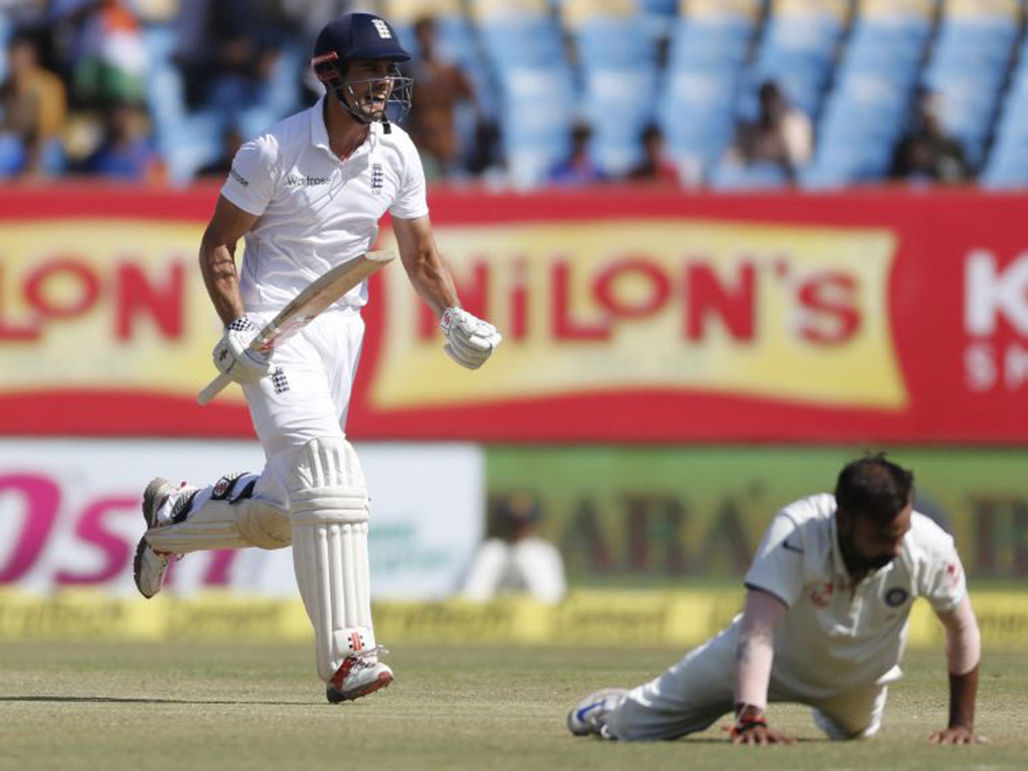 Alastair Cook celebrates reaching the 30th century of his Test career