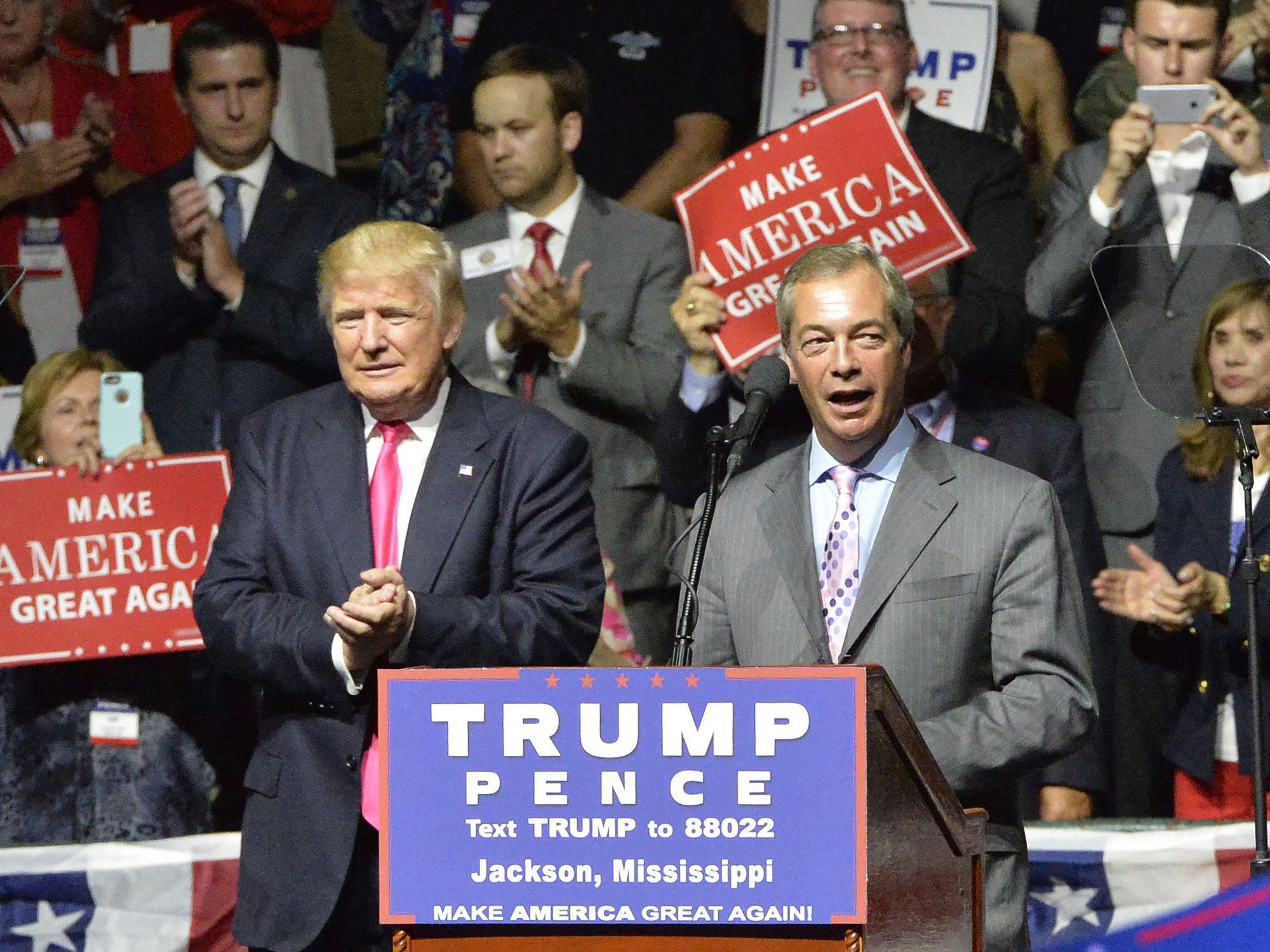 Donald Trump is joined by Nigel Farage at a rally in Mississippi in August