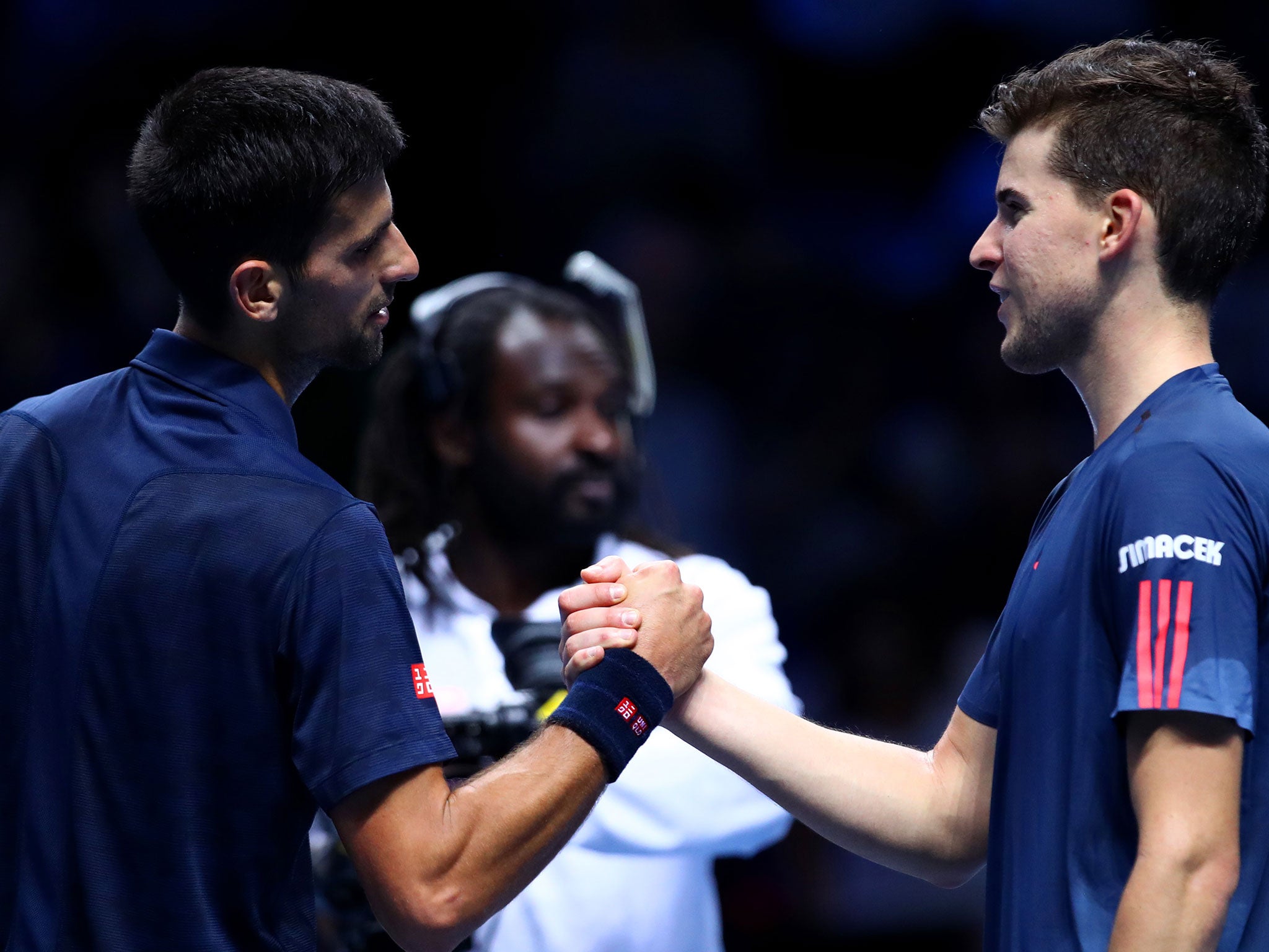 Djokvic and Thiem shake hands after the Serbian clinched victory