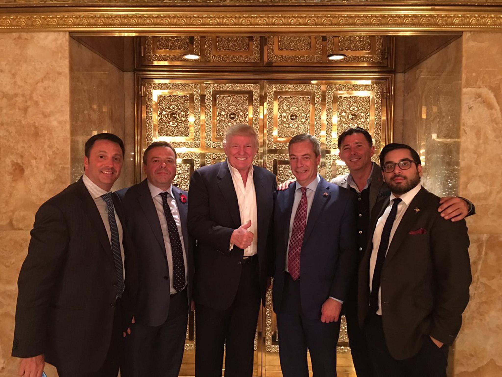 Nigel Farage with President Elect Donald Trump, Arron Banks, second left and Raheem Kassam