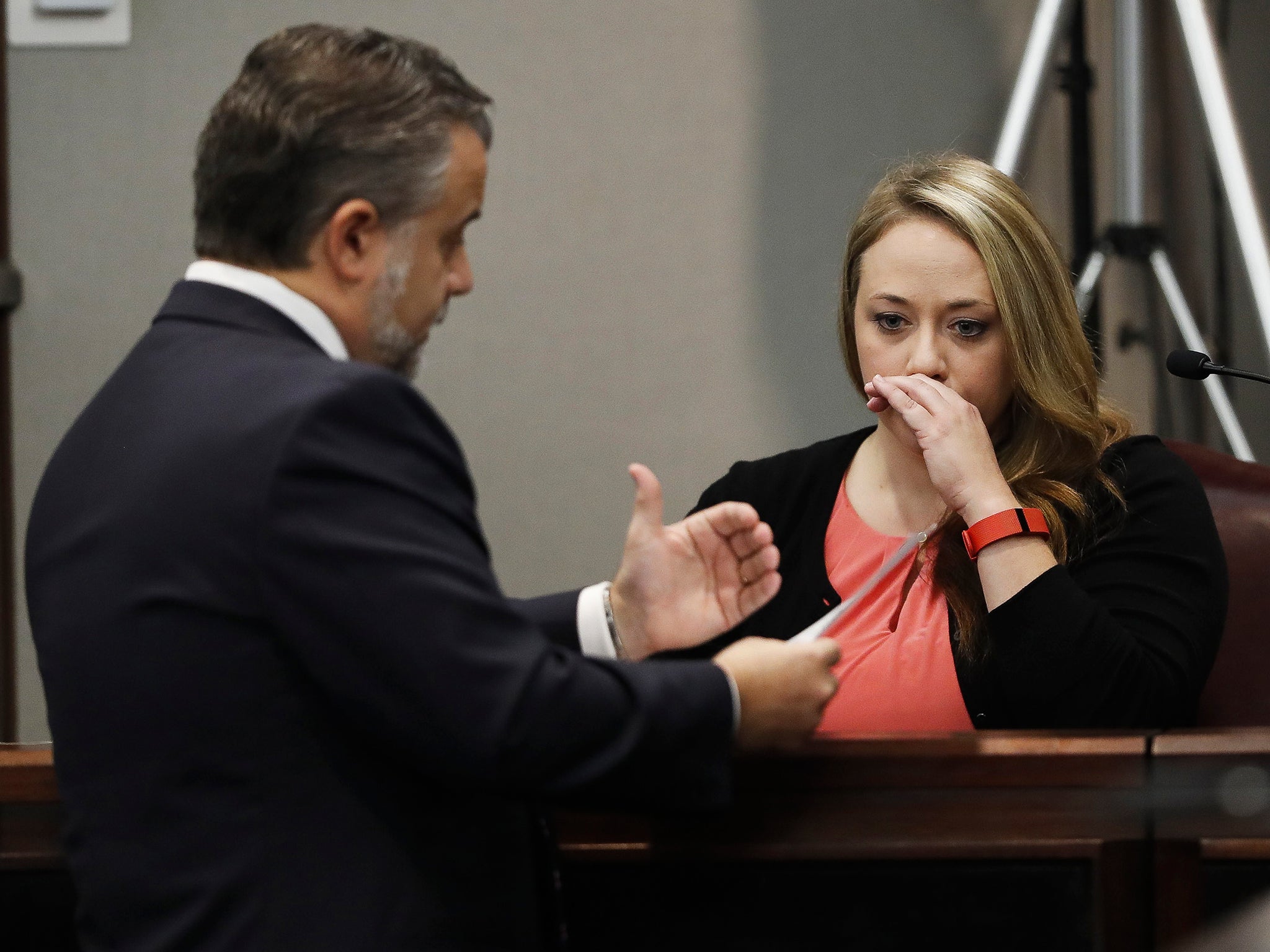 Leanna Taylor listens to a question from defence attorney Maddox Kilgore during a murder trial for her ex-husband Justin Ross Harris who is accused of intentionally killing their son