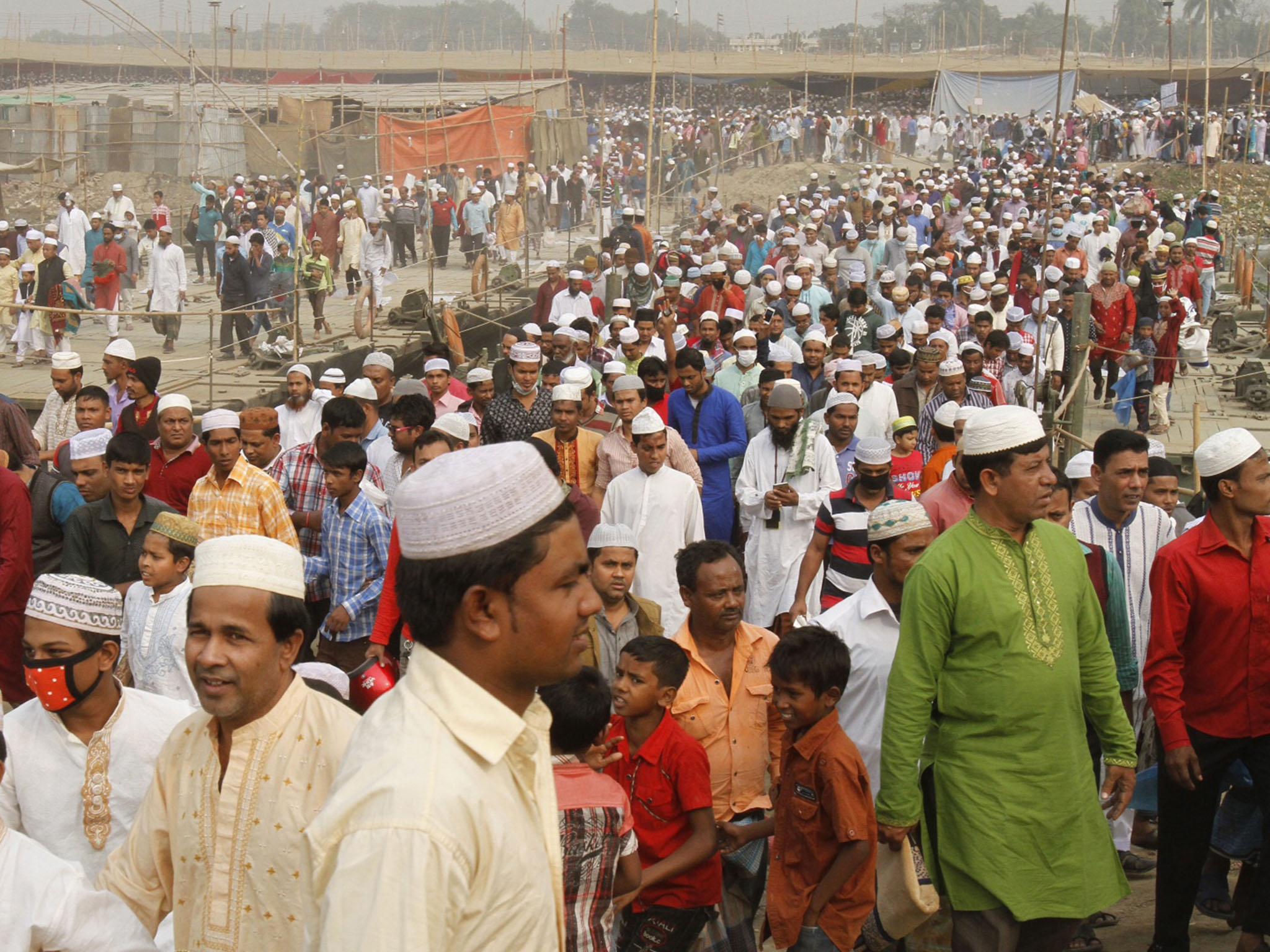 Muslims gathering for religious event in Dhaka, 300km from Thakurpara, a Muslim-majority country