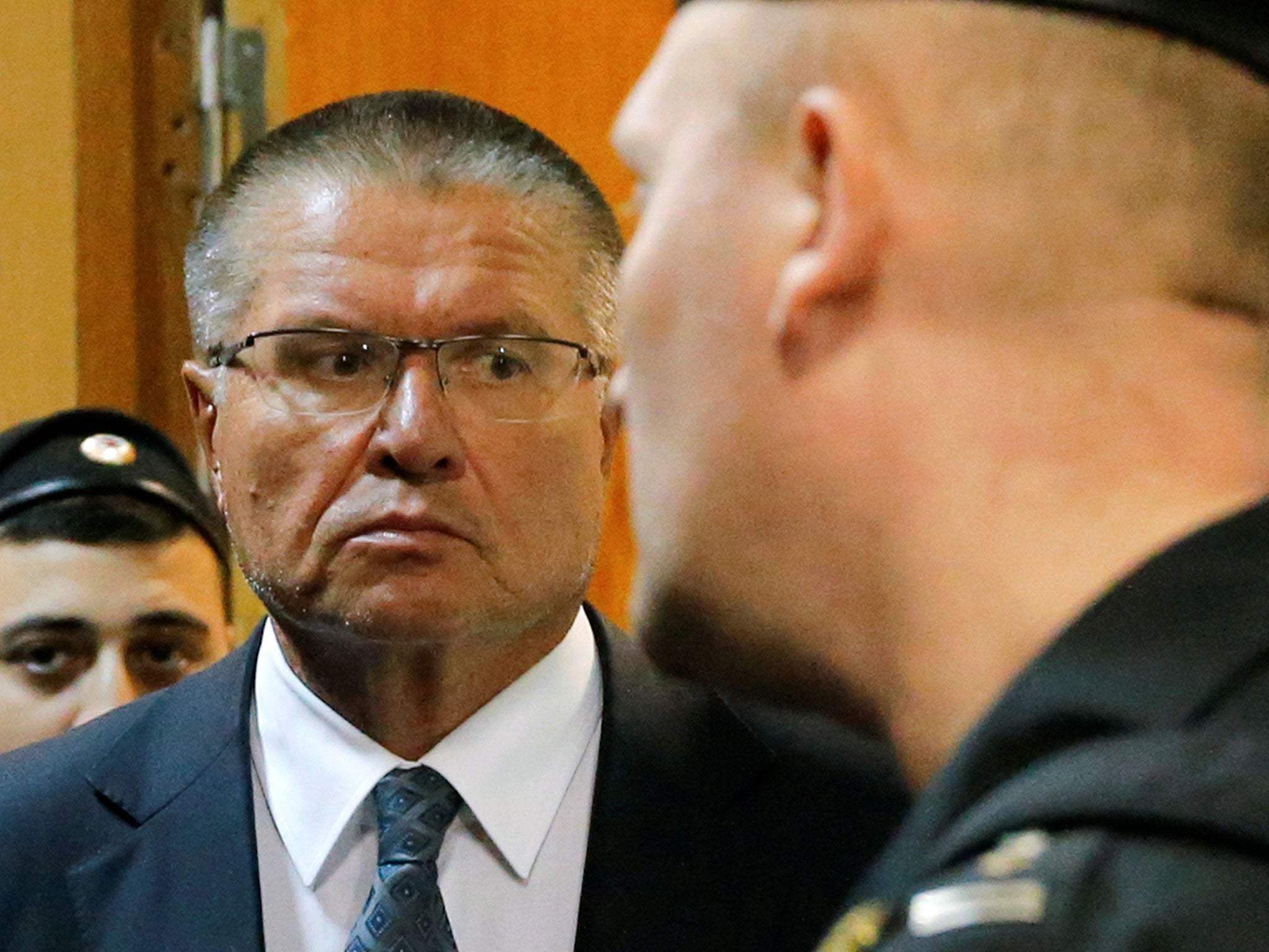 Russian economy minister Alexei Ulyukayev arriving for a hearing at the Basmanny district court in Moscow on 15 November